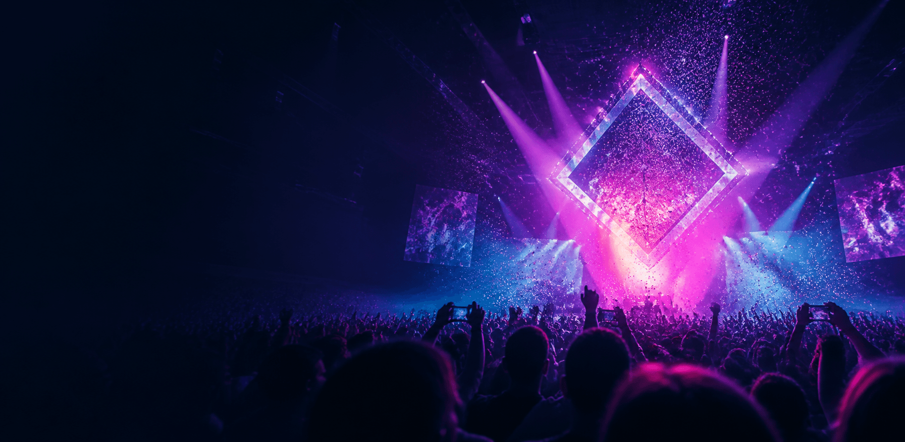 Creator audience celebrating beneath a violet and cyan stage finale